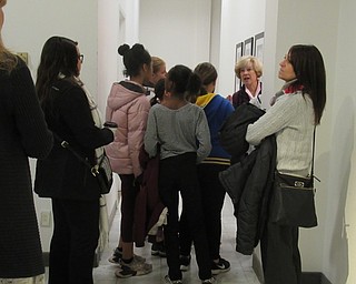 Neighbors | Jessica Harker.Sixth-grade girls from Boardman, along with their mentors, prepared to enter the conference room at Macy's on Nov. 5 for the Girls Empowerment Mentorship Program field trip.