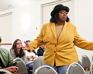 Anita Davis, councilwoman of the 6th Ward, talks about how she does not feel safe in her community and how she always feels the need to check her surroundings during a community meeting at St. Dominic Church on Thursday night. EMILY MATTHEWS | THE VINDICATOR