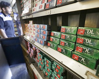 This file photo shows packs of menthol cigarettes and other tobacco products at a store in San Francisco. On Thursday, Nov. 15, 2018, FDA Commissioner Dr. Scott Gottlieb pledged to ban menthol from cigarettes, in what could be a major step to further push down U.S. smoking rates.