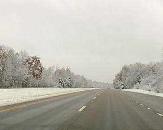 State Route 11 southbound into the Howland area before state Route 82 was clear but cold, with no traffic tie-ups. Nearby Liberty, however, experienced power outages.