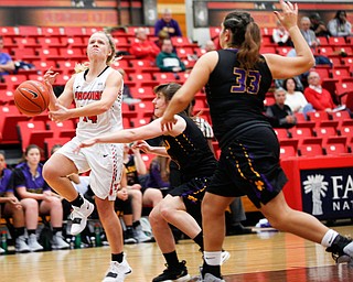 YSU's Melinda Trimmer loses control of the ball during their game against Carlow on Friday night at YSU. EMILY MATTHEWS | THE VINDICATOR