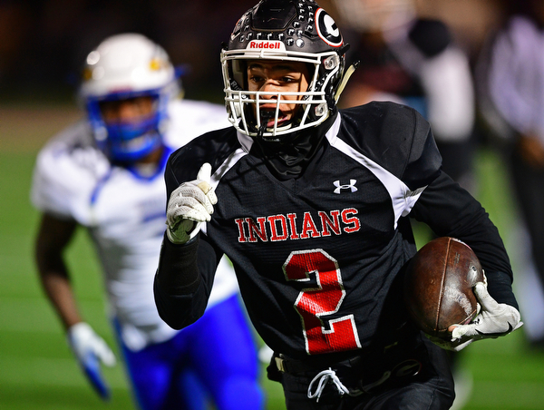 NILEs, OHIO - NOVEMBER 17, 2018: Girard's Morgan Clardy runs down the sideline during the first half of the OHSAA Division 4 Region 13 Regional Final game, Saturday night at Niles McKinley High School. DAVID DERMER | THE VINDICATOR