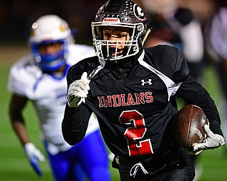 NILEs, OHIO - NOVEMBER 17, 2018: Girard's Morgan Clardy runs down the sideline during the first half of the OHSAA Division 4 Region 13 Regional Final game, Saturday night at Niles McKinley High School. DAVID DERMER | THE VINDICATOR
