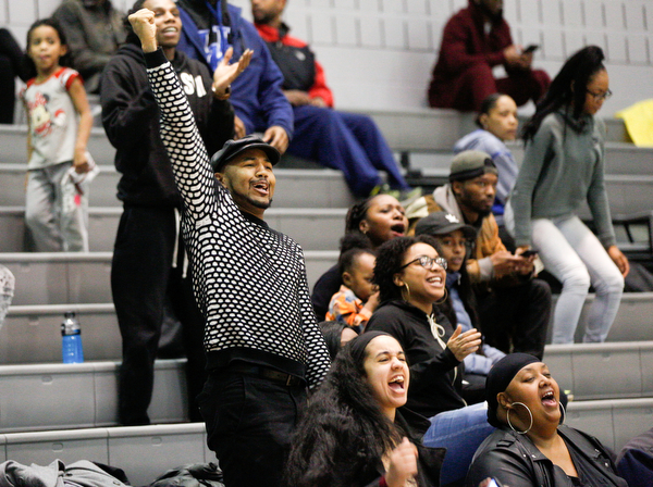 Local actor and performer Trevail Maurice cheers with others during the Rising Stars basketball game at East High School on Sunday. EMILY MATTHEWS | THE VINDICATOR