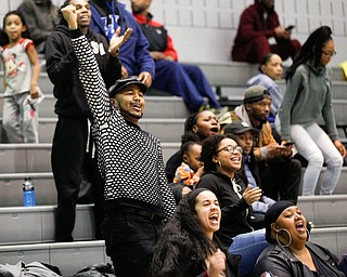 Local actor and performer Trevail Maurice cheers with others during the Rising Stars basketball game at East High School on Sunday. EMILY MATTHEWS | THE VINDICATOR