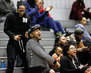 Local actor and performer Trevail Maurice cheers with others during the Rising Stars basketball game at East High School on Sunday. EMILY MATTHEWS | THE VINDICATOR