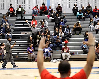 People in the stands cheer during the Rising Stars basketball game at East High School on Sunday. EMILY MATTHEWS | THE VINDICATOR