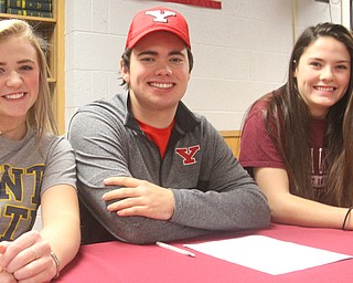 Boardman High School senior athletes made their college commitments Monday. They are, from left, Jackie Harker, gymnastics, Kent State University; Cole Christman, golf, Youngstown State University; and Kaylin Burkey, volleyball, California University of Pennsylvania.
