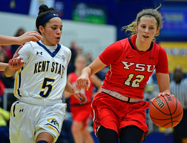 KENT, OHIO - NOVEMBER 20, 2018: Youngstown State's Chelsea Olson dribbles away from Kent State's Mariah Modlkins during the first half of their game, Tuesday night at the Memorial Athletic and Convocation Center. Kent State won 62-34. (David Dermer/Special to the Record Courier)
