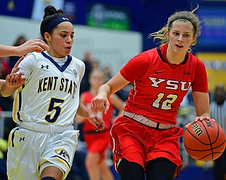 KENT, OHIO - NOVEMBER 20, 2018: Youngstown State's Chelsea Olson dribbles away from Kent State's Mariah Modlkins during the first half of their game, Tuesday night at the Memorial Athletic and Convocation Center. Kent State won 62-34. (David Dermer/Special to the Record Courier)