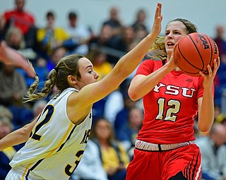 KENT, OHIO - NOVEMBER 20, 2018: Youngstown State's Chelsea Olson puts up a shot while being pressured by Kent State's Hannah Young during the first half of their game, Tuesday night at the Memorial Athletic and Convocation Center. Kent State won 62-34. (David Dermer/Special to the Record Courier)