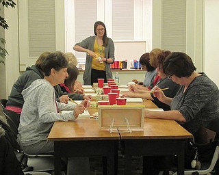 Neighbors | Jessica Harker.Community members gathered for the Art with Andrea class at the Austintown library on Oct. 23 with all supplies provided by the library.