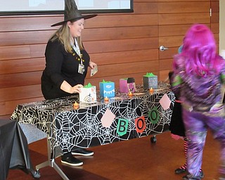 Neighbors | Jessica Harker.Librarian assistant Amelia Dale spoke with children at the Monster Mash Halloween Party she planned on Oct. 29.