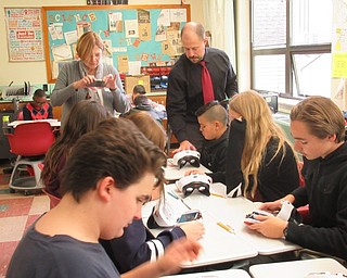 Neighbors | Jessica Harker.Students in Glenwood Junior High School prepared to look through the school's Google Expedition glasses during Eric Diefenderfer's science class on Oct. 30.
