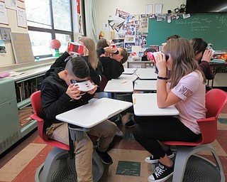 Neighbors | Jessica Harker.Students in Eric Diefenderfer's science class looked through the Google Expedition glasses at different expeditions to get a better understanding of various forms of energy.