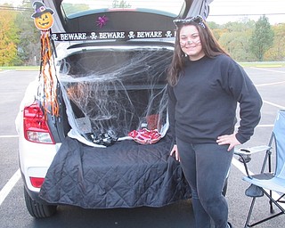 Neighbors | Jessica Harker.Mia DiCioccio, a student at Poland Seminary High School and a member of the school's Spanish club, participated in the Trunk or Treat event, helping to raise money for the clubs scholarship fund on Oct. 30.