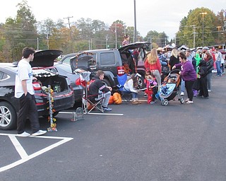 Neighbors | Jessica Harker.Community members traveled to Poland Seminary High School's parking lot on Oct. 30 for the Spanish club fundraiser Trunk or Treat where students decorated the trunks of their cars and passed out candy.