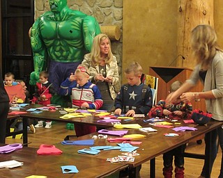 Neighbors | Jessica Harker.Moms and sons dressed as superheroes worked on crafts at Boardman Park Nov. 8 at the Mom and Son Date Knight annual event.