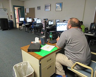 Neighbors | Jessica Harker.Poland Union computer teacher Nick Blanch gave a presentation about the fish students could vote for Nov. 9 for the schools salt water aquarium.