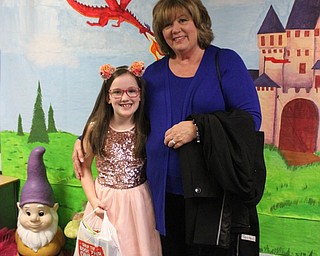 Neighbors | Abby Slanker.C.H. Campbell Elementary School second-grade student Maricel Jewell and her grandmother, Sandy Jewell, enjoyed browsing the book fair in the library during the school’s annual Grandparents Day.