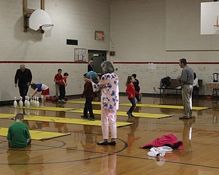 Neighbors | Abby Slanker.Second-grade students and their grandparents at C.H. Campbell Elementary School had a ball bowling in the gym during the school’s annual Grandparents Day.