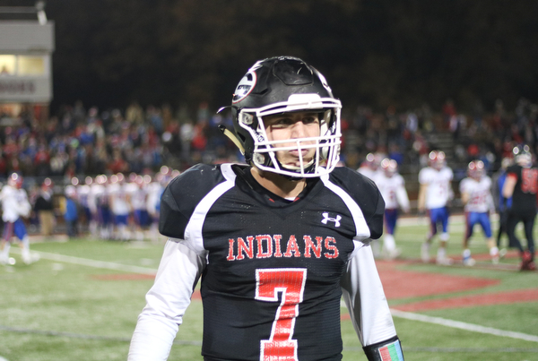 Girard's Mark Waid walks off the field after kneeling the ball to kill the clock and win the game 53-48. Waid threw for totaled for 576 yards and 6 touchdowns.. ETHAN CLEWELL | THE VINDICATOR