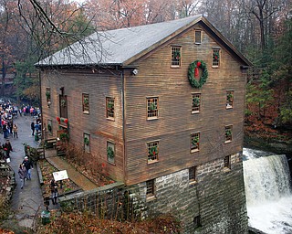 Lanterman's Mill is decked out in wreaths for its Olde Fashioned Christmas event on Saturday. EMILY MATTHEWS | THE VINDICATOR