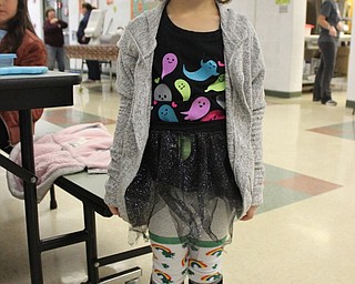 Neighbors | Abby Slanker.A C.H. Campbell Elementary School kindergartner went above and beyond to celebrate Crazy Sock Day by wearing two pairs of crazy socks to show her school spirit during the school’s annual Spirit Week on Oct. 30.