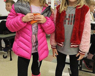 Neighbors | Abby Slanker.One C.H. Campbell Elementary School kindergartner wore cupcake socks, while another donned football socks for Crazy Sock Day to show their school spirit on Oct. 30.