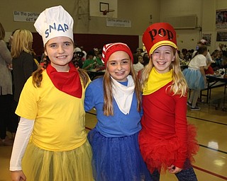 Neighbors | Abby Slanker.Three Canfield Village Middle School fifth-grade students dressed up as Snap, Crackle and Pop for the school’s annual Halloween Dress Up Day on Oct. 31.