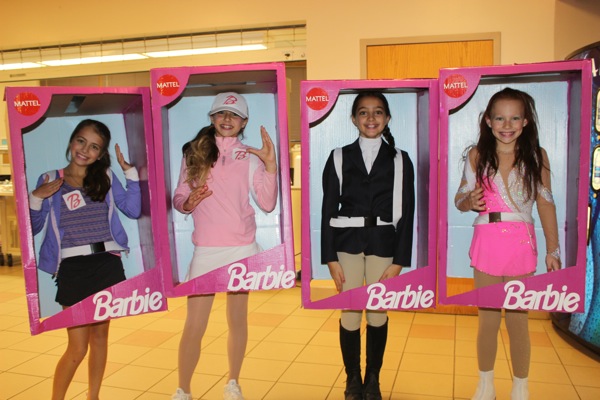 Neighbors | Abby Slanker.A group of Canfield Village Middle School fifth-graders dressed up as Barbies, complete with boxes on Oct. 31.
