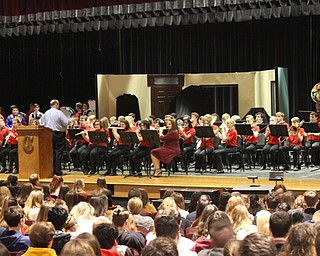 Neighbors | Abby Slanker.The Canfield High School concert band, under the direction of band director Mike Kelly, performed at the school’s annual Veterans Day Assembly on Nov. 12.