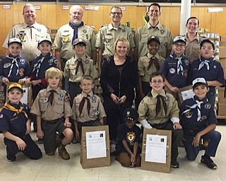 Neighbors | Submitted.Some of the members of Cub Scout Pack 25, chartered to Canfield United Methodist Church, recently paid a visit to the Canfield Operation Blessing food pantry to learn about their efforts to feed those in need in the community, as well as to establish their first food drive to benefit the organization. Pictured are, from left, (front) Sammy Burkey, Jamie Jarvis, Alex Bort, Victor Flowers, Zach Bostocky, Adam Nastasi; (middle) Drew Jursa, Noah Jursa, Aidan Kerns, Julie Kercher - Operation Blessing director, Kaden Flowers, John Styranec, Scott Burkey; (back) Jason Henry - Cubmaster, Gary Yankowski, Tim Styranec, Michael Bort and Hazel Jarvis.