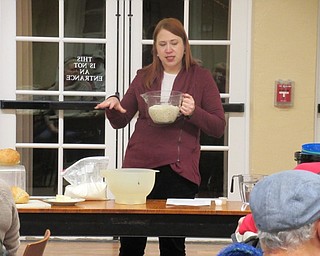 Neighbors | Jessica Harker.Librarian Missy Williams discussed the difference between no knead bread dough and regular bread dough Nov. 19 at the Poland library.