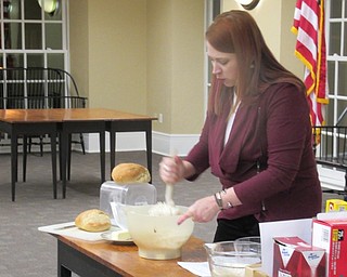 Neighbors | Jessica Harker.Poland librarian Missy Williams demonstrated her no knead bread recipe for community members.
