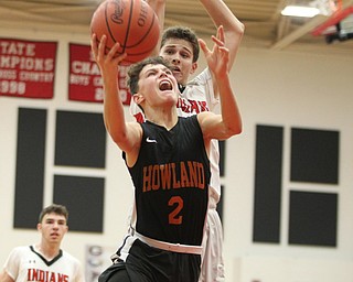 Howland's Gage Tomko (2) goes in for a layup during Friday nights matchup at Girard High School.  Dustin Livesay  |  The Vindicator  11/30/18  Girard