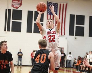 Christian Graziano (22) takes a 3-pointer over Howland's Nathan Barrett(40) during Friday nights matchup at Girard High School.  Dustin Livesay  |  The Vindicator  11/30/18  Girard