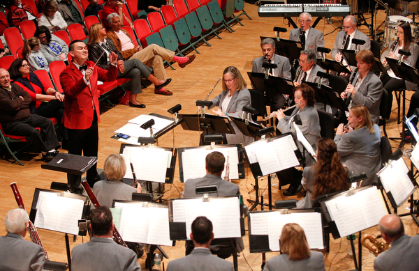 The Packard Band, led by Dr. Stephen L. Gage, perform Country Cookin' Christmas during their annual Christmas Spectacular at W.D. Packard Music Hall on Sunday afternoon. EMILY MATTHEWS | THE VINDICATOR