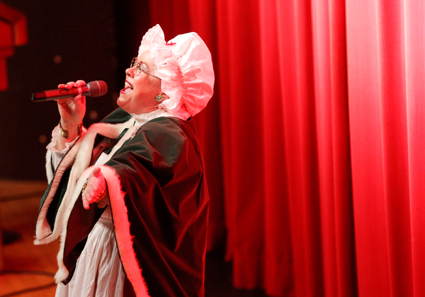 Mrs. Claus sings Jingle Bells during The Packard Band annual Christmas Spectacular at W.D. Packard Music Hall on Sunday afternoon. EMILY MATTHEWS | THE VINDICATOR