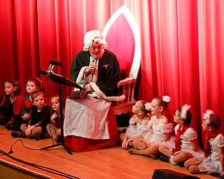 Mrs. Claus reads The Night Before Christmas during The Packard Band annual Christmas Spectacular at W.D. Packard Music Hall on Sunday afternoon. EMILY MATTHEWS | THE VINDICATOR