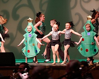 Dancers from Jill's Dance Shop perform to Rockin' Around the Christmas Tree during The Packard Band annual Christmas Spectacular at W.D. Packard Music Hall on Sunday afternoon. EMILY MATTHEWS | THE VINDICATOR