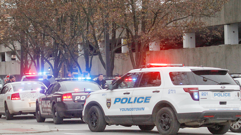 Various law-enforcement agencies were on hand to search for a man who was supposed to have a gun Monday afternoon on the Youngstown State University campus. A suspect later surrendered to university police.