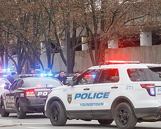 Various law-enforcement agencies were on hand to search for a man who was supposed to have a gun Monday afternoon on the Youngstown State University campus. A suspect later surrendered to university police.