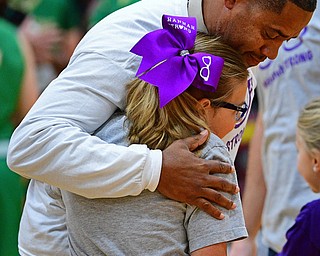 CANFIELD, OHIO - DECEMBER 4, 2018: Hannah Tringhese gets a hug from Ursuline head coach Keith Gunther during the first half of their game, Tuesday night at South Range High School. DAVID DERMER | THE VINDICATOR