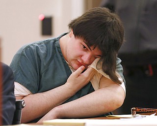 Andrea Balcer wipes tears during her sentencing hearing for killing her parents, Tuesday, Dec. 4, 2018, at the Capital Judicial Center in Augusta, Maine. Balcer was 17 at the time of the Oct. 31, 2016, stabbings at their Winthrop home. The teenager told a police dispatcher that she "snapped" on the night of the stabbings.