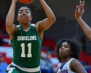 AUSTINTOWN, OHIO - DECEMBER 5, 2018: Ursuline's DayShanette Harris goes to the basket after getting past Fitch's Jada Lazaro during the second half of their game, Wednesday night at Austintown Fitch High School. DAVID DERMER | THE VINDICATOR