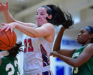 AUSTINTOWN, OHIO - DECEMBER 5, 2018: Fitch's Sabrina Hunter grabs a rebound away from Ursuline's Any Curd during the second half of their game, Wednesday night at Austintown Fitch High School. DAVID DERMER | THE VINDICATOR