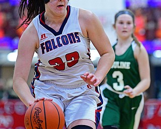 AUSTINTOWN, OHIO - DECEMBER 5, 2018: Fitch's Sabrina Hunter dribbles ahead of Ursuline's Jamie Nelson during the second half of their game, Wednesday night at Austintown Fitch High School. DAVID DERMER | THE VINDICATOR