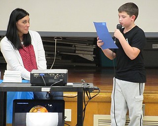 Neighbors | Jessica Harker.Joseph Burton spoke about his father who served during Market Street's annual Veterans Day Assembly Nov. 9.