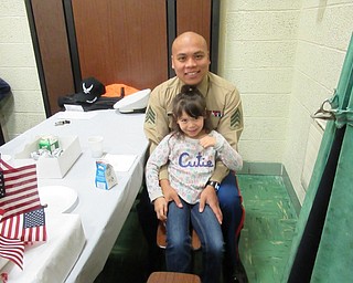 Neighbors | Jessica Harker.Sgt. Chan Sy and Alicia Sy, a first grader, attended Stadium Drive's annual Veterans Day Breakfast on Nov. 9.